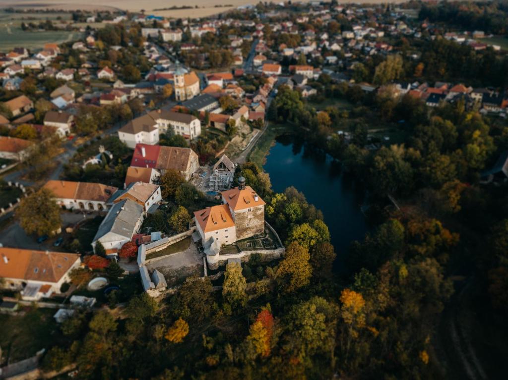 an aerial view of a town with a lake at Ubytování u Fraňků in Malešov