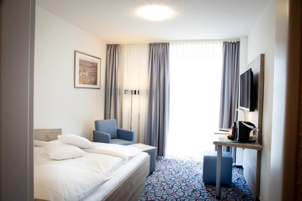 TV a/nebo společenská místnost v ubytování Pfefferhöhe Hotel & Restaurant