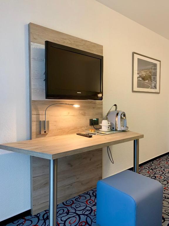 TV a/nebo společenská místnost v ubytování Pfefferhöhe Hotel & Restaurant