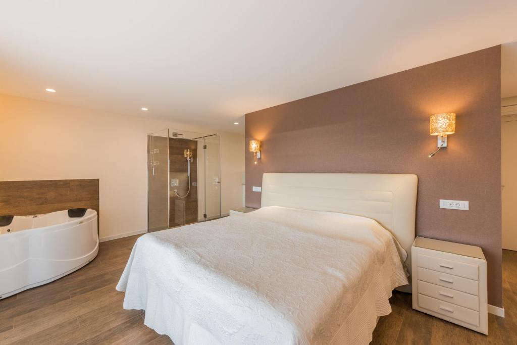 Posteľ alebo postele v izbe v ubytovaní Apartment TESI