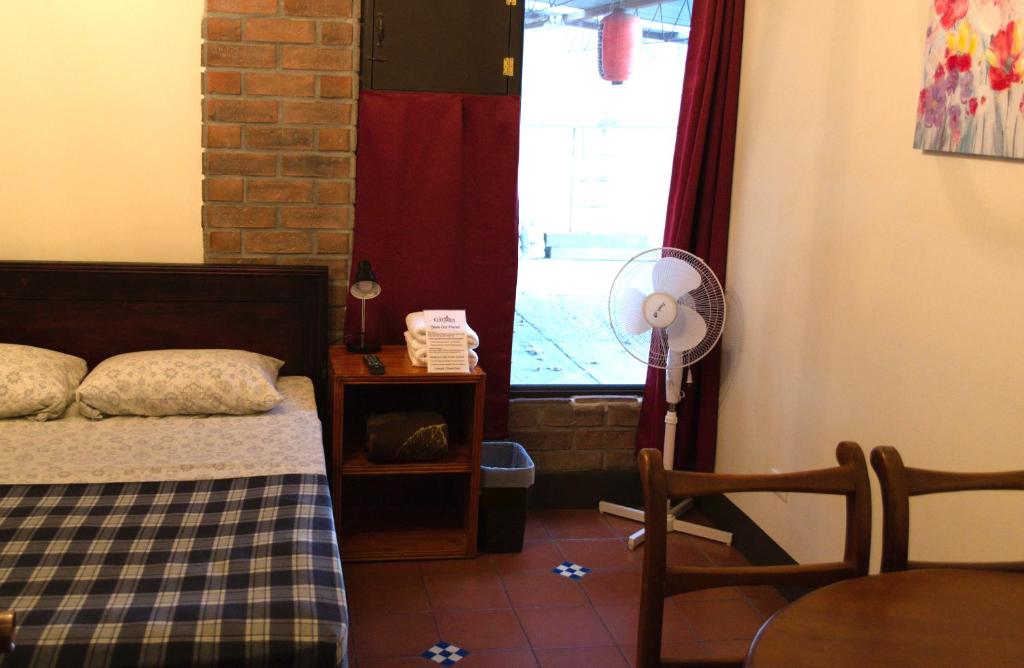 Postel nebo postele na pokoji v ubytování Hotel Columbus