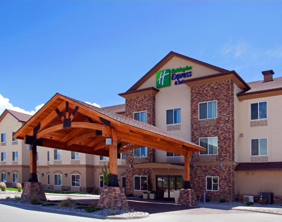 a hotel with a sign on the front of it at Holiday Inn Express Hotel & Suites Silt - Rifle, an IHG Hotel in Silt