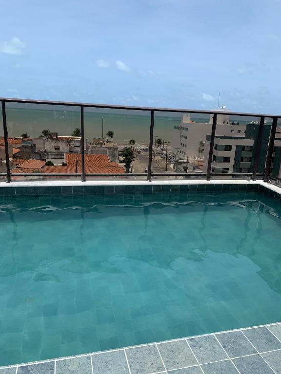  Flat aconchegante a 50 metros do mar