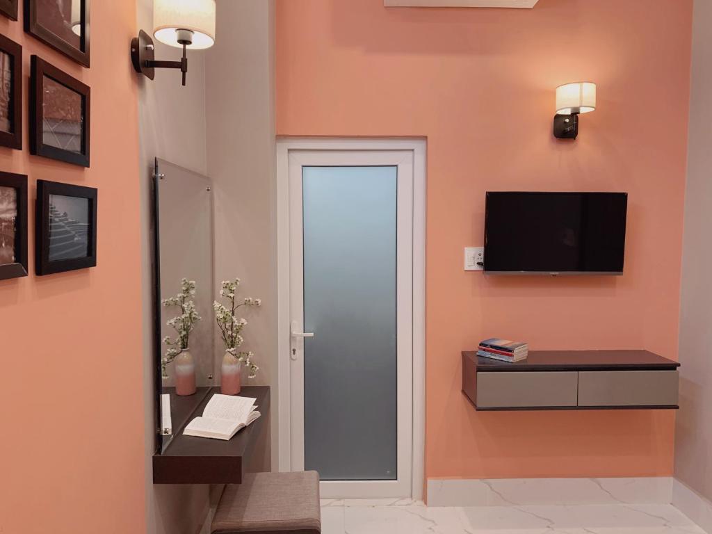 TV a/nebo společenská místnost v ubytování 54 Homestay