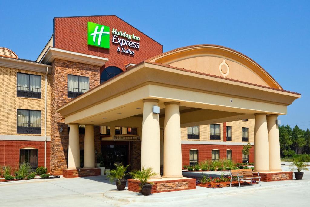 a front view of a hotel with a building at Holiday Inn Express Hotel & Suites Greenville, an IHG Hotel in Greenville