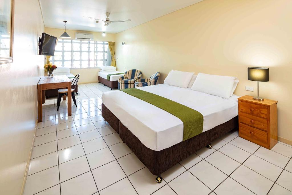 Postel nebo postele na pokoji v ubytování Hides Hotel
