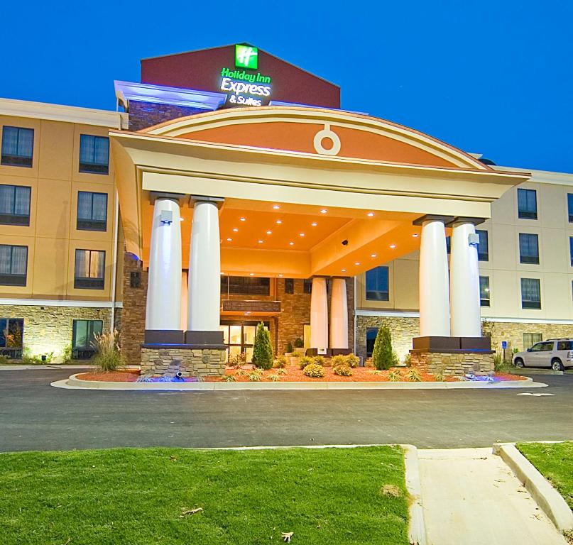 a hotel building with a lobby with a sign on it at Holiday Inn Express Fulton, an IHG Hotel in Fulton