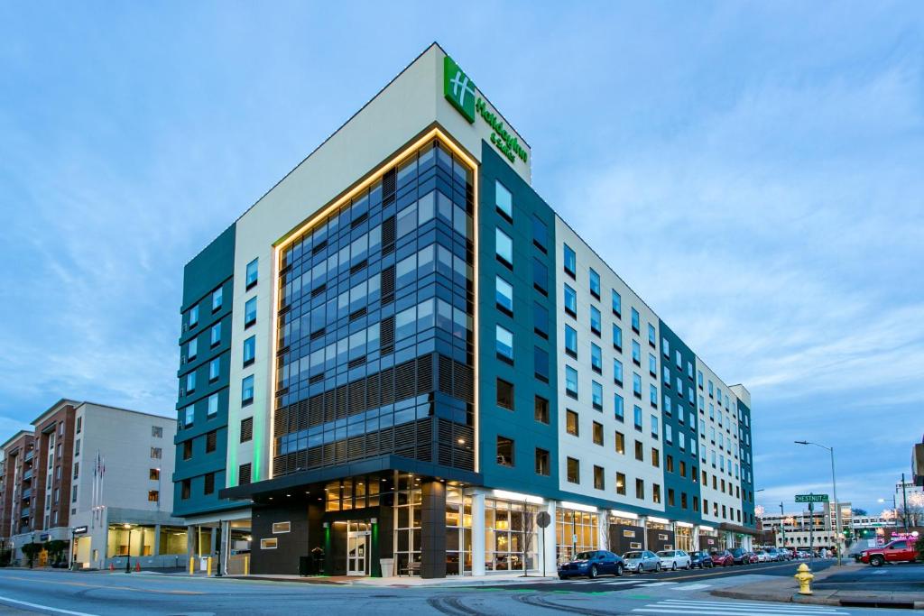 a building with a sign on the top of it at Holiday Inn Hotel & Suites Chattanooga, an IHG Hotel in Chattanooga