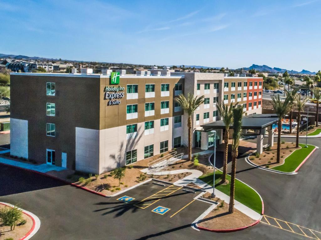 an aerial view of a hotel with a parking lot at Holiday Inn Express & Suites Lake Havasu - London Bridge, an IHG Hotel in Lake Havasu City