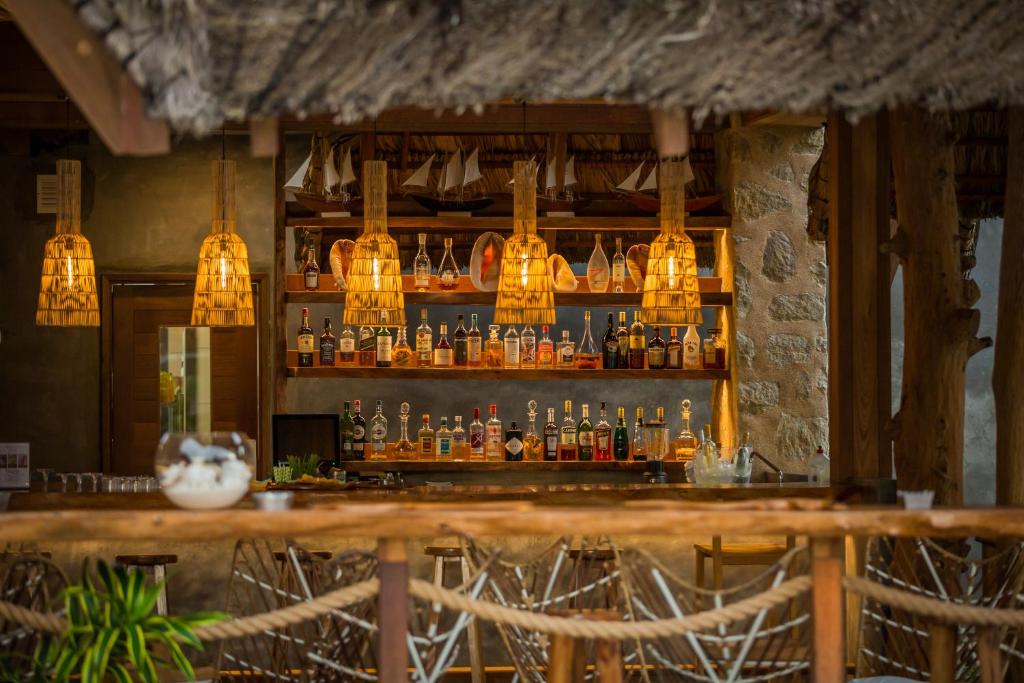 Nápoje v ubytování Les Lauriers Eco Hotel