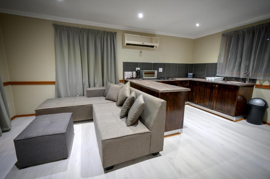 Η κουζίνα ή μικρή κουζίνα στο Bains Lodge