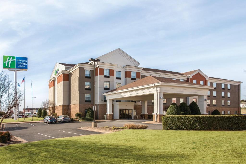 a hotel with a gazebo in front of a building at Holiday Inn Express Hotel & Suites Lawton-Fort Sill, an IHG Hotel in Lawton