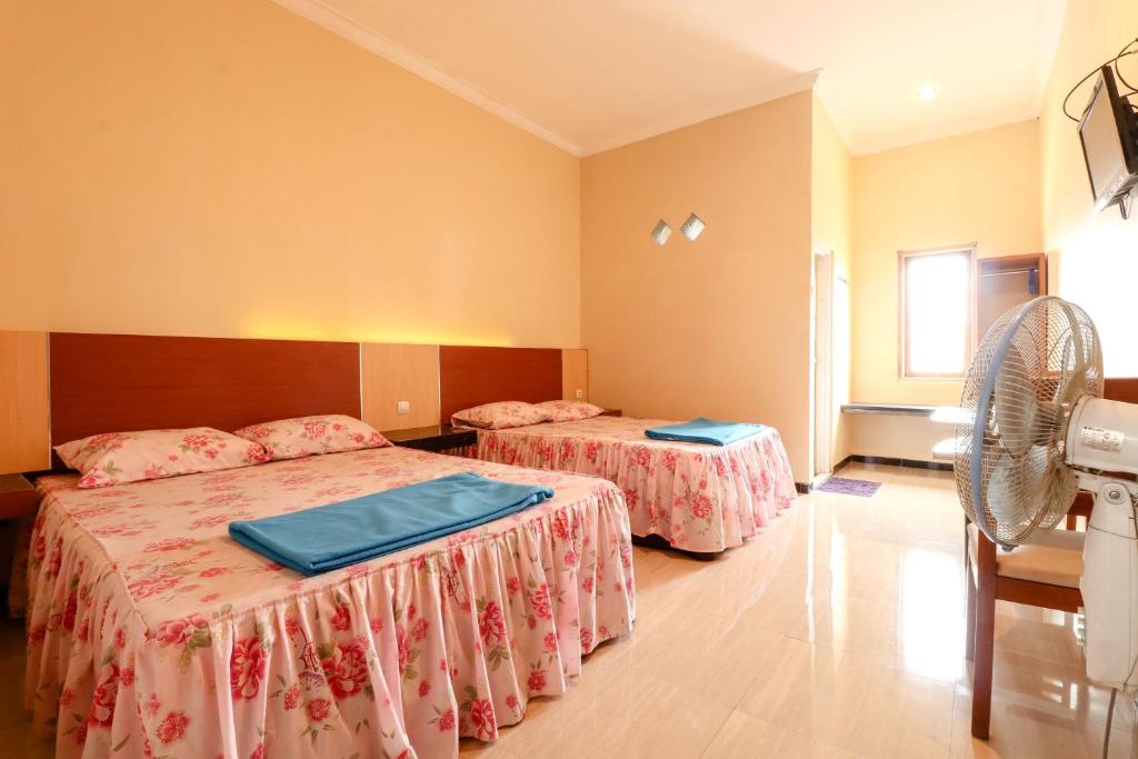 The Joglo Family Hotel - Standaard Viervoudige Kamer