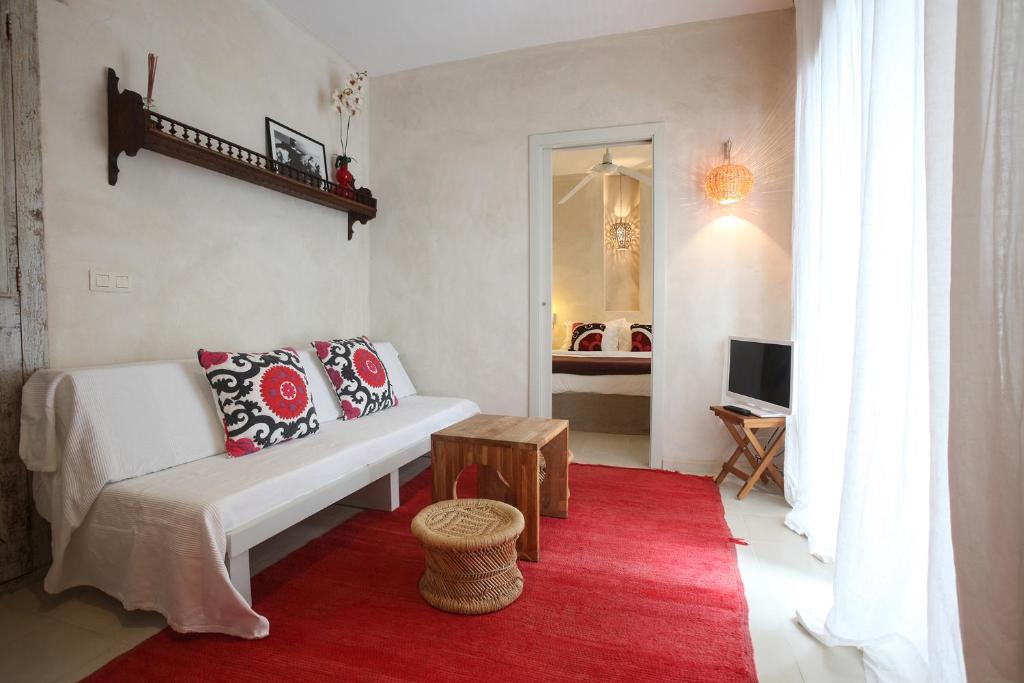 Postel nebo postele na pokoji v ubytování Apartamentos Caravane