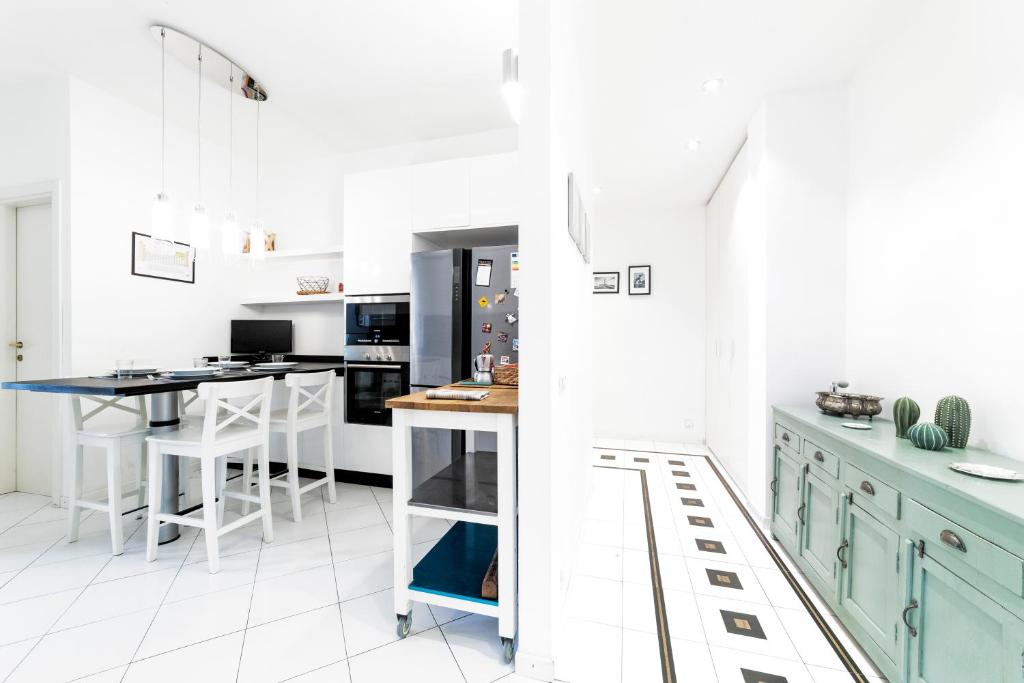 Kuchyňa alebo kuchynka v ubytovaní Loreto Elegant Flat