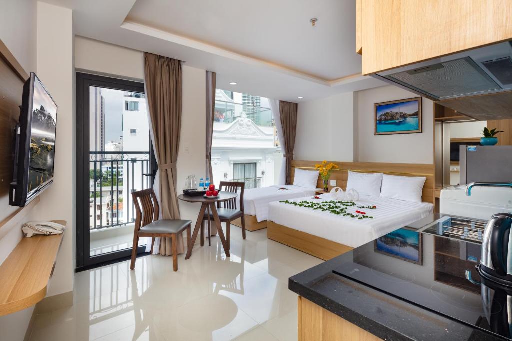 Nhà bếp/bếp nhỏ tại XO Hotel &amp; Apartments
