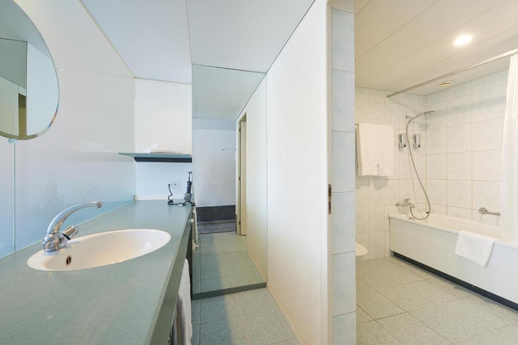 Koupelna v ubytování Hotel City am Bahnhof