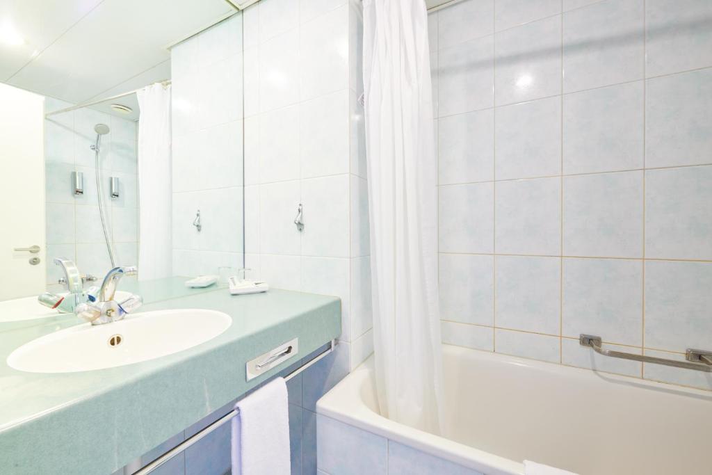 Koupelna v ubytování Hotel City am Bahnhof