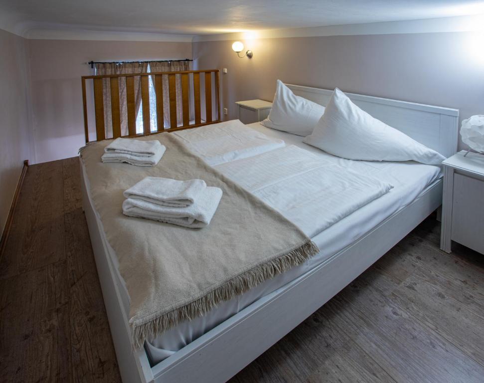 Postel nebo postele na pokoji v ubytování Michalska Apartment