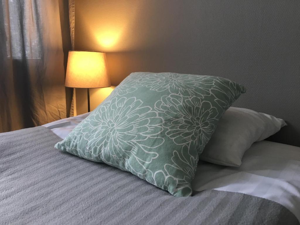 Postel nebo postele na pokoji v ubytování Hotel Yöpuu