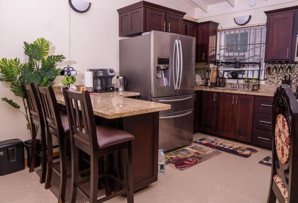 Kuchyň nebo kuchyňský kout v ubytování Sweet Holiday Haven