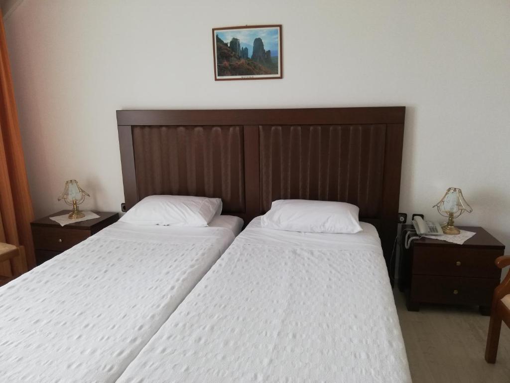 Postel nebo postele na pokoji v ubytování Hotel Paradise