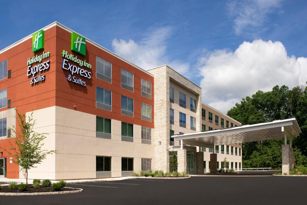 a rendering of the front of a hotel at Holiday Inn Express & Suites - North Brunswick by IHG in North Brunswick