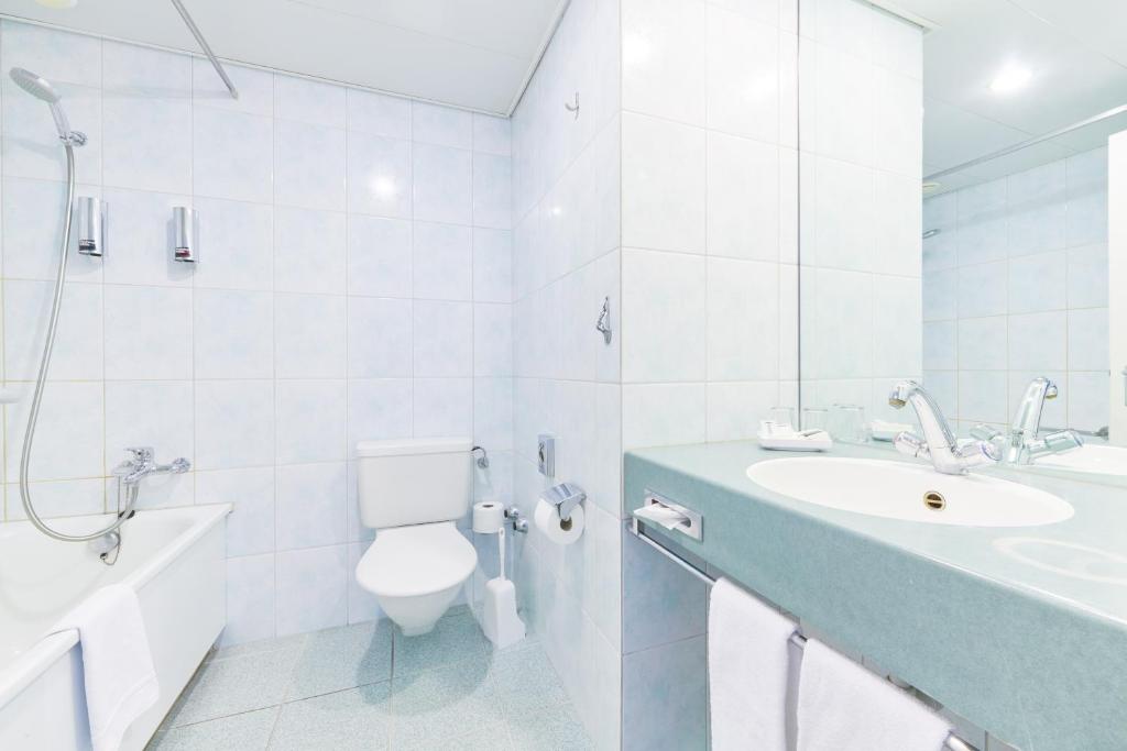 Koupelna v ubytování Hotel City am Bahnhof