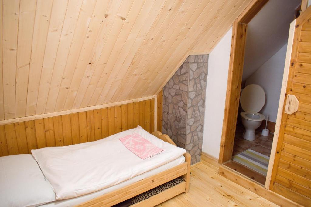 Postel nebo postele na pokoji v ubytování CHATA JURAJ