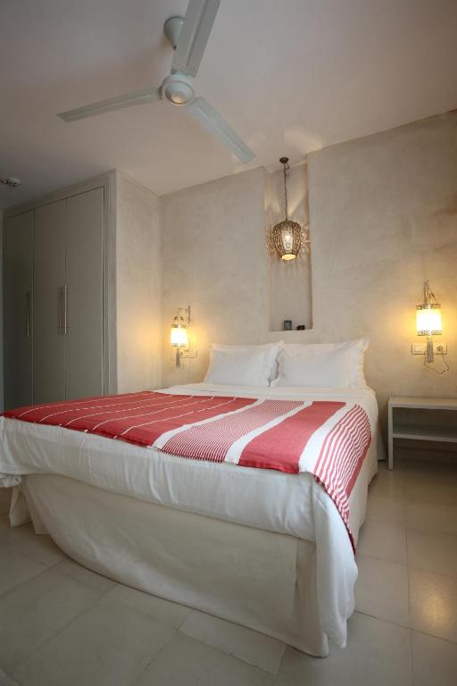 Postel nebo postele na pokoji v ubytování Apartamentos Caravane