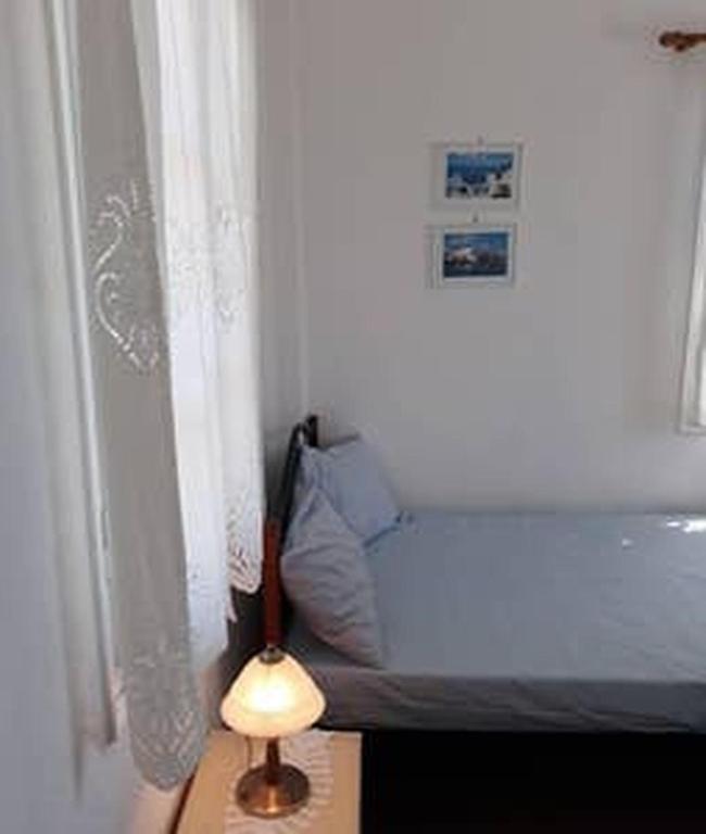 Postel nebo postele na pokoji v ubytování Village house in Paros