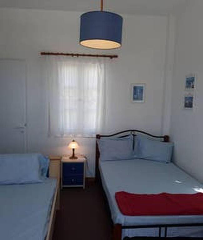 Postel nebo postele na pokoji v ubytování Village house in Paros