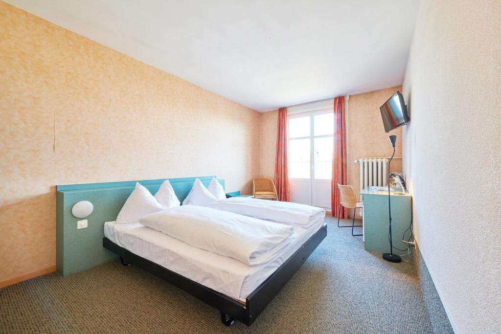 Postel nebo postele na pokoji v ubytování Hotel City am Bahnhof
