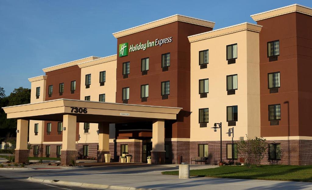 a rendering of the front of a hotel at Holiday Inn Express & Suites Omaha South Ralston Arena, an IHG Hotel in Omaha