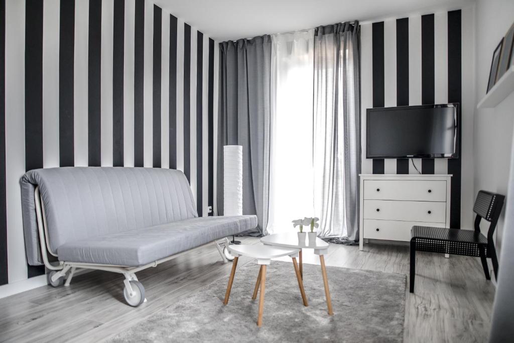 Televízia a/alebo spoločenská miestnosť v ubytovaní Apartament Nadbystrzycka no.14