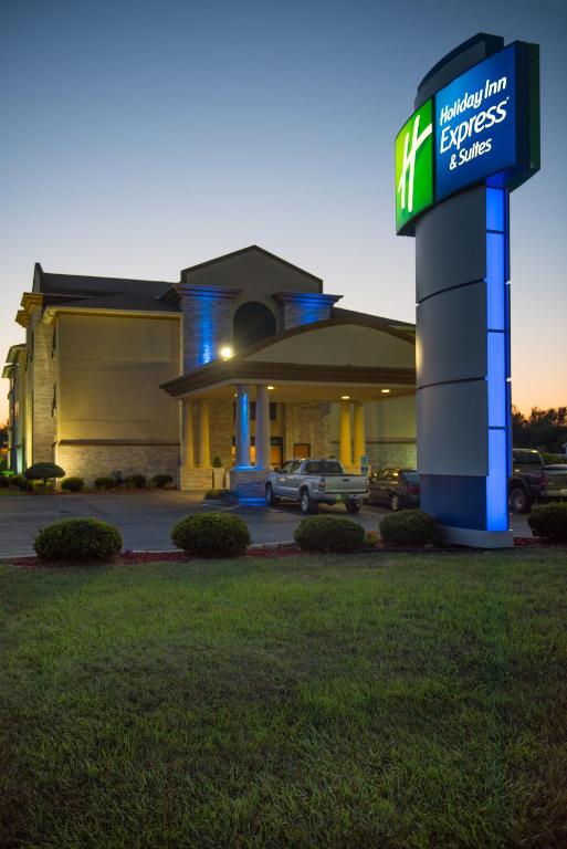 a inn express sign in front of a building at Holiday Inn Express Hotel & Suites Wauseon by IHG in Wauseon
