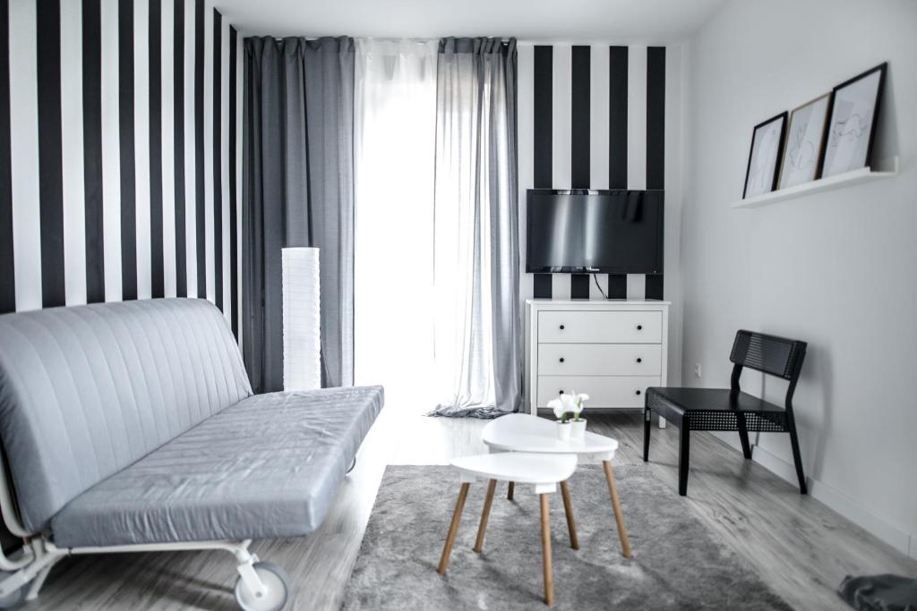 Televízia a/alebo spoločenská miestnosť v ubytovaní Apartament Nadbystrzycka no.14
