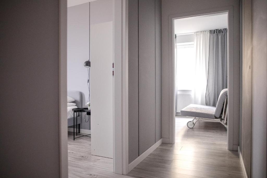 Posteľ alebo postele v izbe v ubytovaní Apartament Nadbystrzycka no.14