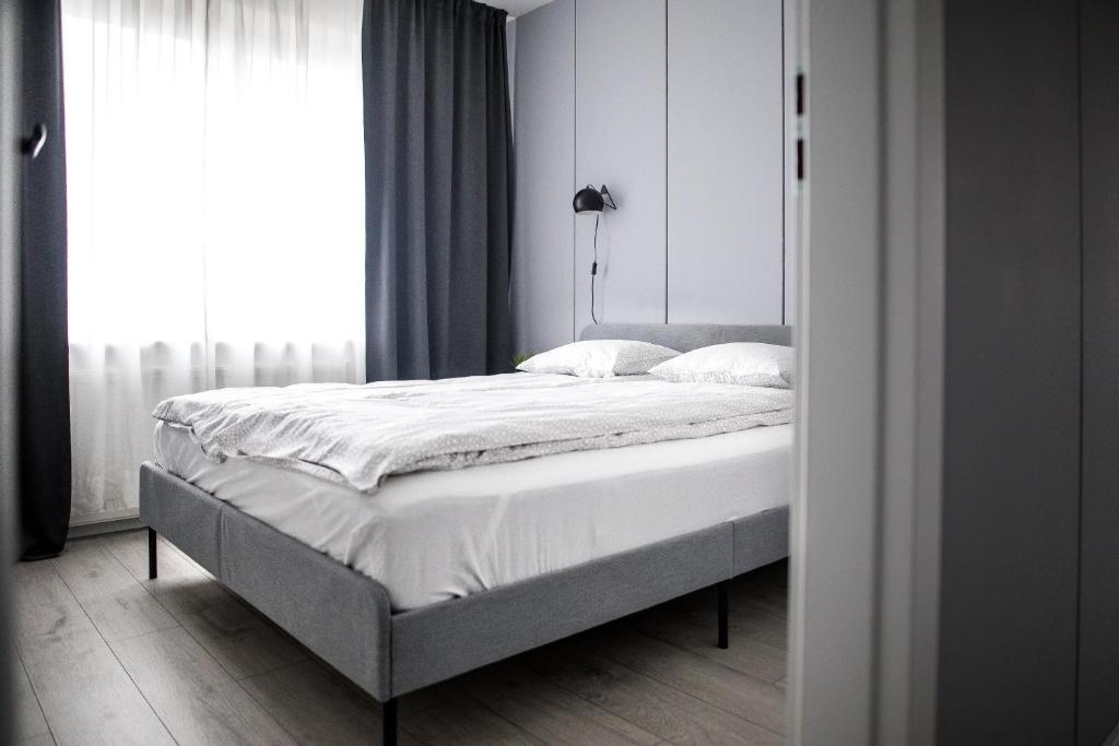 Posteľ alebo postele v izbe v ubytovaní Apartament Nadbystrzycka no.14