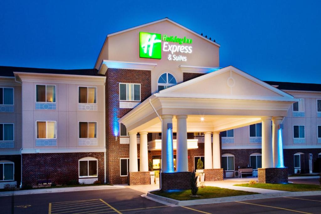 a large building with a sign on the front of it at Holiday Inn Express Hotel & Suites - Dubuque West, an IHG Hotel in Dubuque