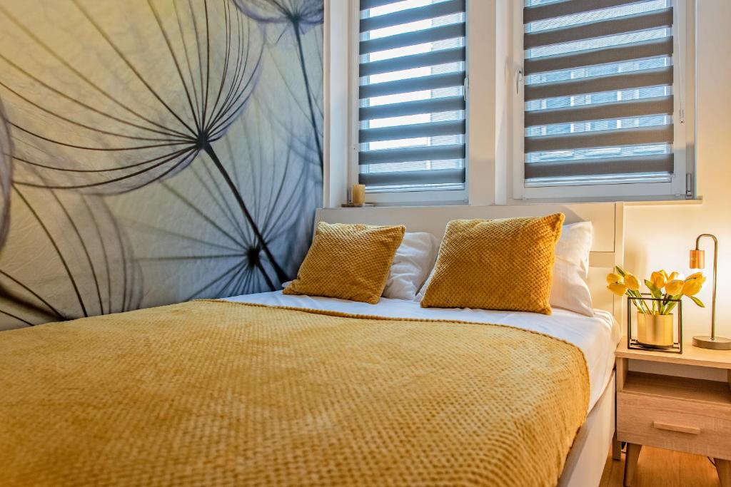 Posteľ alebo postele v izbe v ubytovaní 3D KOSCIUSZKI 19 Apartament