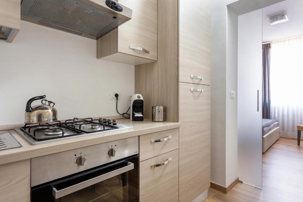 Kuchyňa alebo kuchynka v ubytovaní Centre Apartment Grotte Bianche