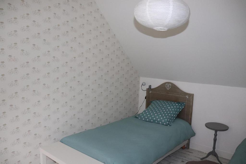 Postel nebo postele na pokoji v ubytování Gîte de la Belle Roze