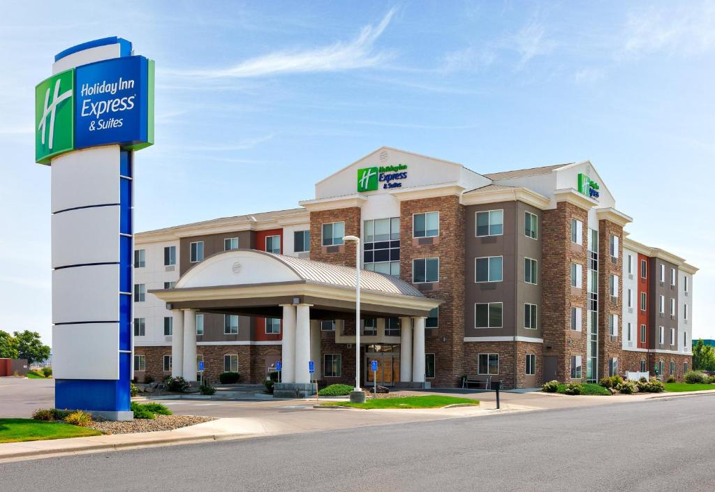 a hotel with a sign in front of a building at Holiday Inn Express Hotel & Suites Ontario, an IHG Hotel in Ontario