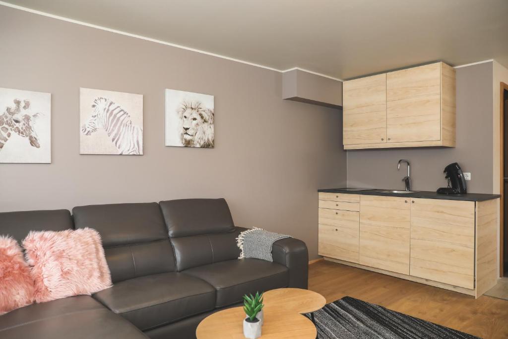 Posezení v ubytování E18 Apartments