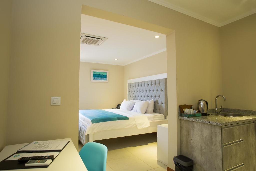 Postel nebo postele na pokoji v ubytování Hotel Islander Bonaire