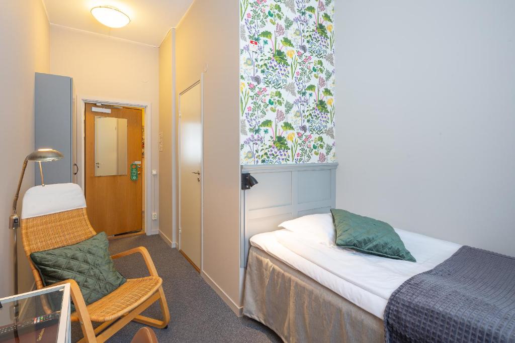 Postel nebo postele na pokoji v ubytování Hotell Leksand