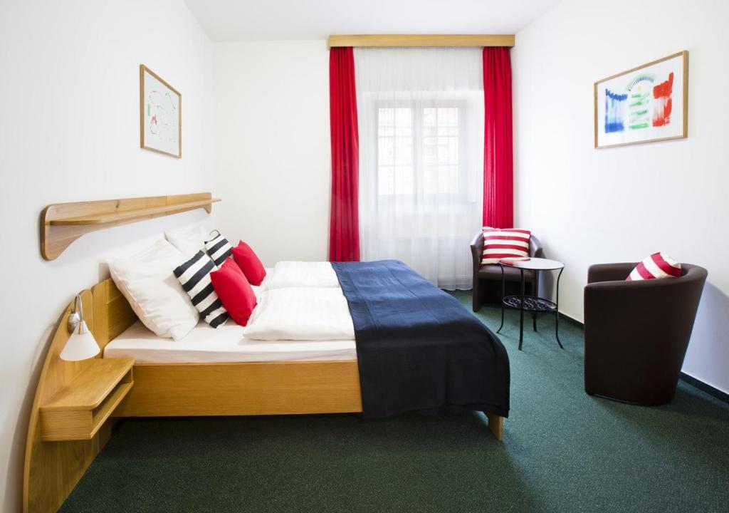 Postel nebo postele na pokoji v ubytování Hotel Otar