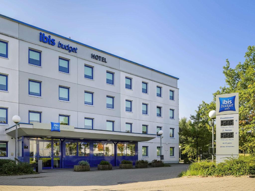 a hotel building with a sign in front of it at ibis Budget Essen Nord in Essen
