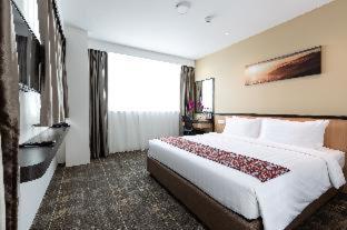 Postel nebo postele na pokoji v ubytování Hotel 7 Suria